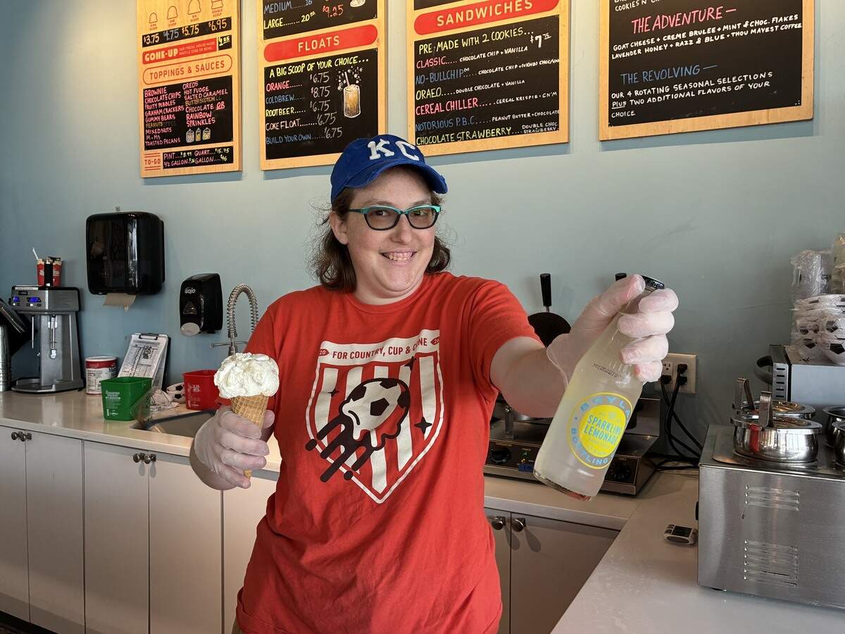 Imrie Goller, a server at Bette Rae’s Ice Cream in Prairie Village, 5330 West 95th St., showing an ice cream flavor and drink ordered by a number of players on England’s World Cup national team.