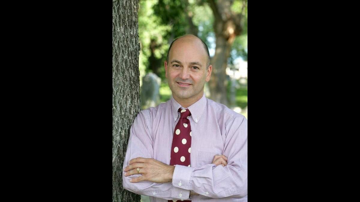 David Jackson, 54, of Kansas City, is a local historian and genealogist. When he was 11, he learned his great-great grandfather was enslaved.