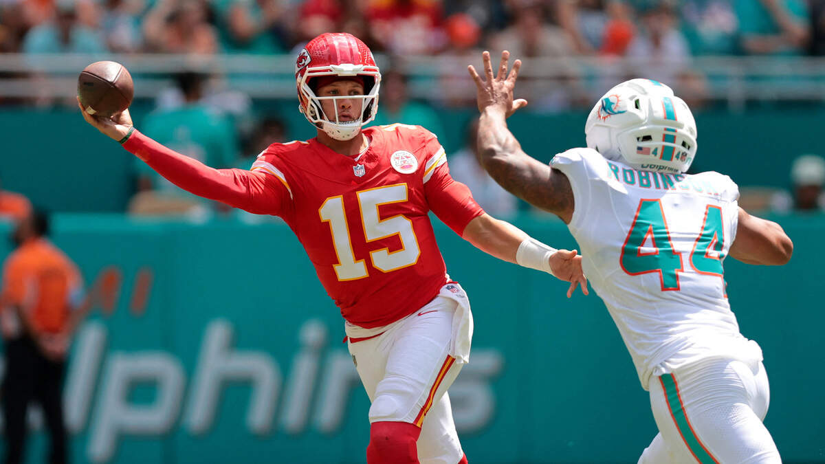 Kansas City Chiefs quarterback Patrick Mahomes (15) passes the ball against Miami Dolphins defensive end Chop Robinson (44) during an NFL Week 3 game at Hard Rock Stadium in Miami Gardens, Florida, on Sunday, Sept. 27, 2026.