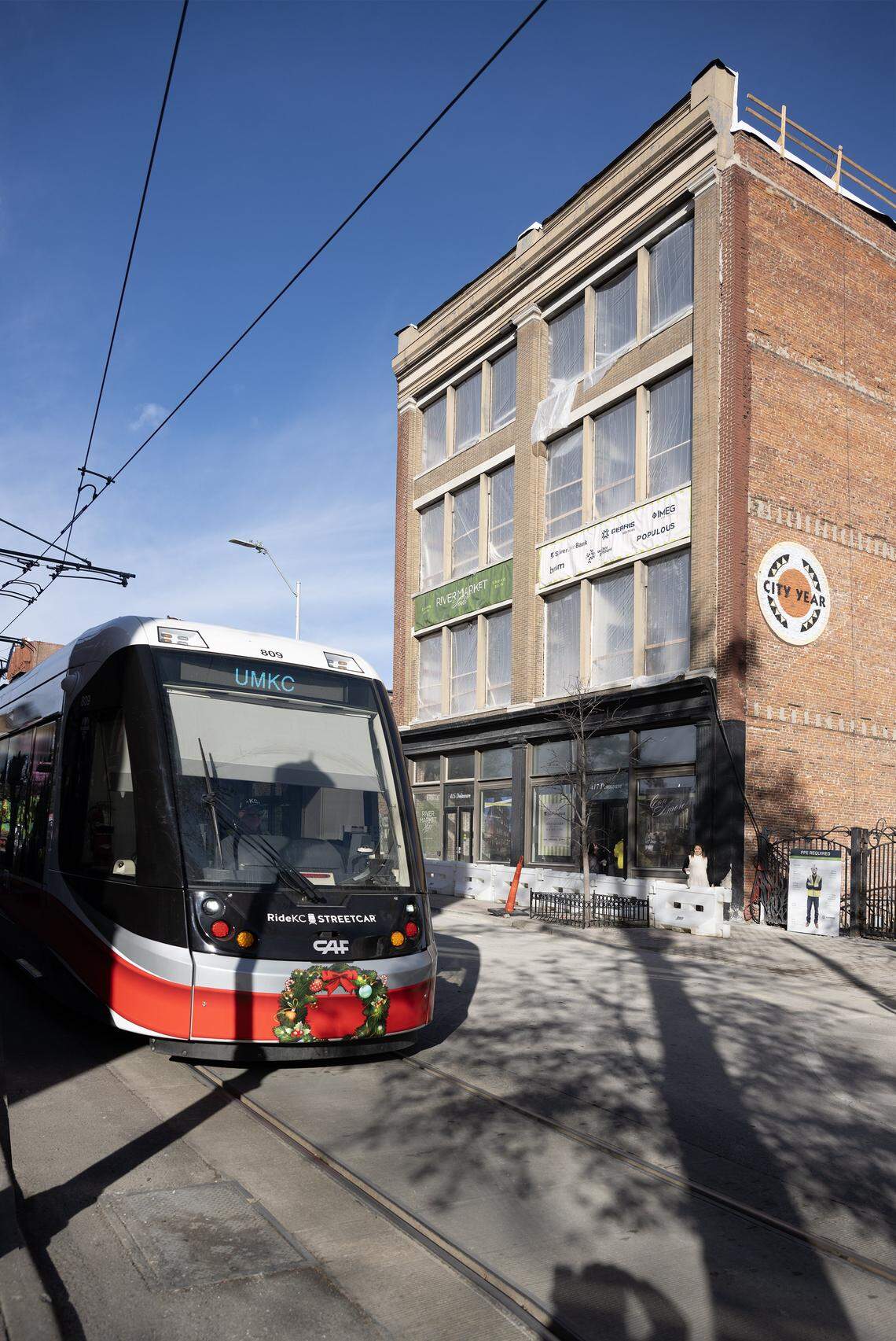 The KC Streetcar travels past the new River Market Hotel at 415 Delaware St. in Kansas City, where a groundbreaking ceremony took place on Tuesday, Dec. 9, 2025. Renovations are currently underway to transform the historic 1880s building into a 45-room boutique hotel.