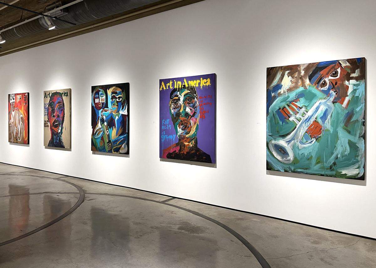 A row of paintings by Harold Smith seen during his solo exhibition We Shall Not Be Moved opened at Sherry Leedy Contemporary Art.