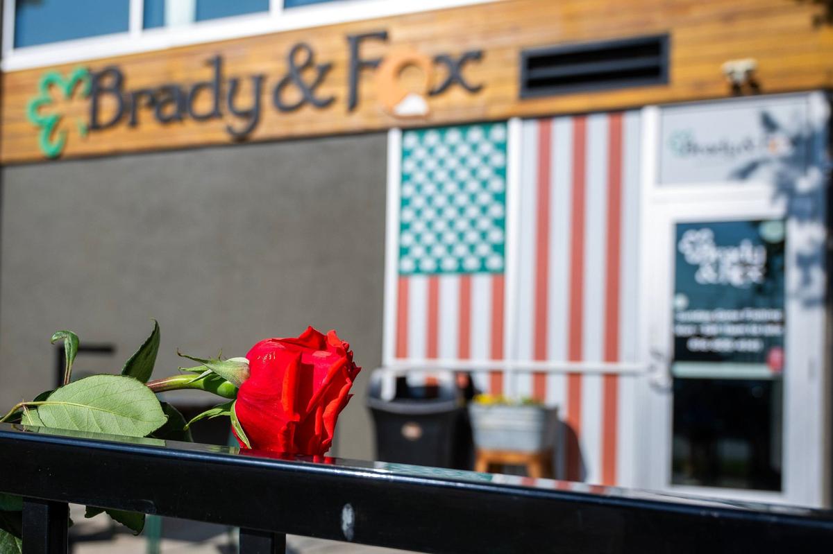 A red rose was placed near the entrance of Brady &amp; Fox restaurant on Aug. 29, 2024, in Kansas City after the death of Shaun Brady, the restaurant’s owner.