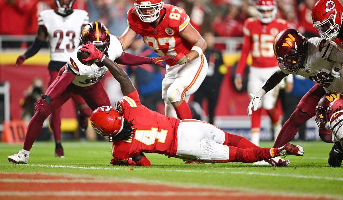 Kansas City Chiefs wide receiver Rashee Rice (4) puts the ball over the goal line but was down just short of scoring a touchdown in the second quarter against the Washington Commanders on Monday, Oct. 27, 2025, at GEHA Field at Arrowhead Stadium.