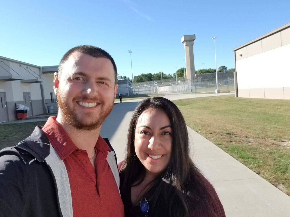 Cody Carter and his wife Valeria Carter standing inside Lansing Correctional Facility. Carter runs a prison ministry program with a branch in Kansas, which consists of a variety of faith and character-based classes such as anger management, substance abuse, Bible studies and more.