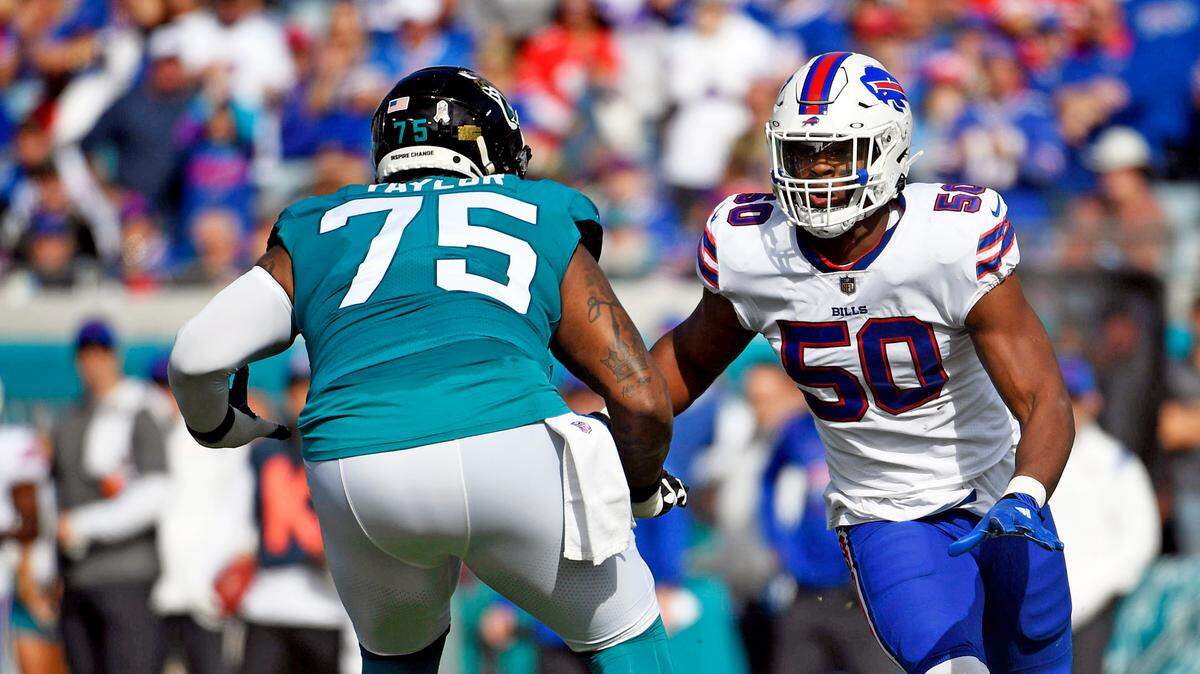 Nov 7, 2021; Jacksonville, Florida, USA; Buffalo Bills defensive end Greg Rousseau (50) rushes the quarterback past Jacksonville Jaguars offensive lineman Jawaan Taylor (75) during the first quarter at TIAA Bank Field. Mandatory Credit: Melina Myers-USA TODAY Sports