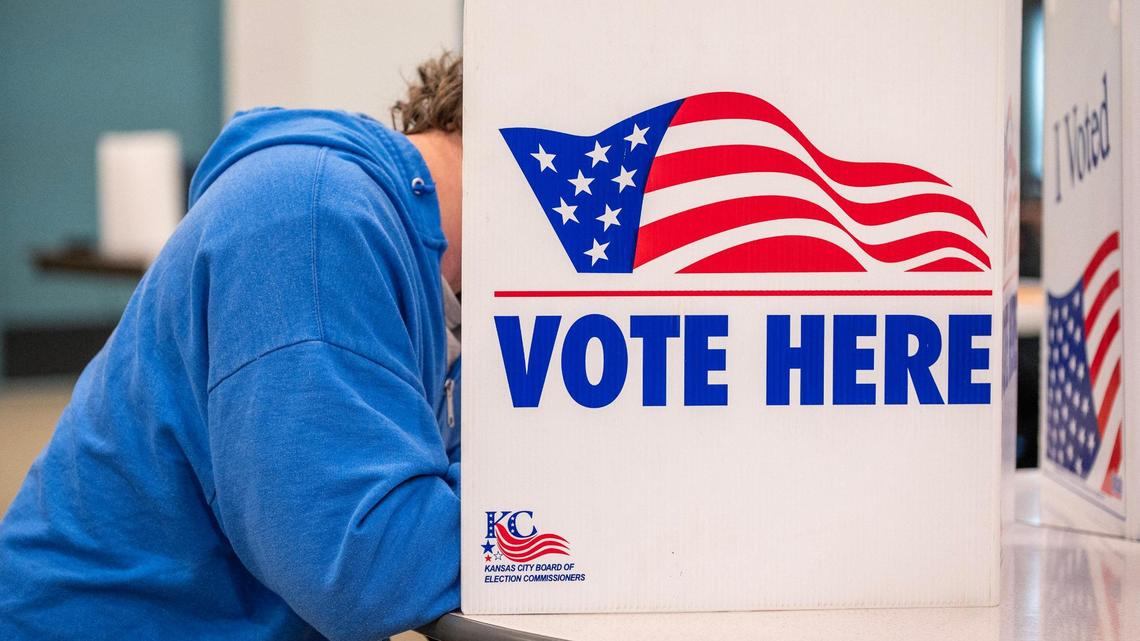 A voter casts their ballot for the general election at Country Club Christian Church on Tuesday, Nov. 5, 2024, in Kansas City.