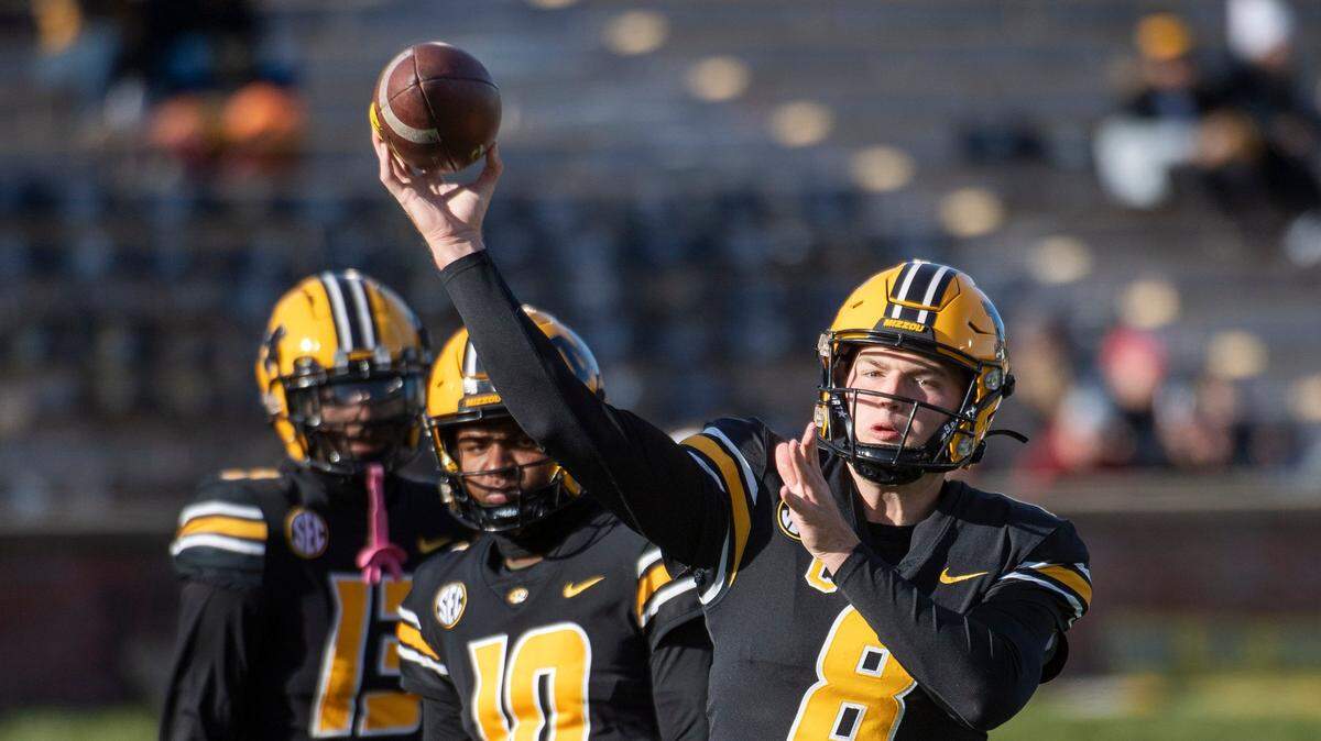 Missouri quarterback Connor Bazelak warms up before an NCAA college football game against South Carolina Saturday, Nov. 13, 2021, in Columbia, Mo. (AP Photo/L.G. Patterson)