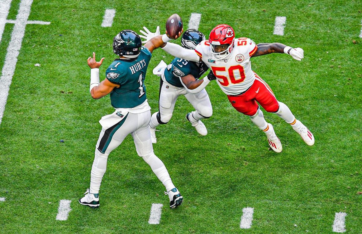 Kansas City Chiefs linebacker Willie Gay jumps to stop a pass by Philadelphia Eagles quarterback Jalen Hurts in the first quarter during Super Bowl LVII Sunday, Feb. 12, 2023, in Glendale, Ariz.