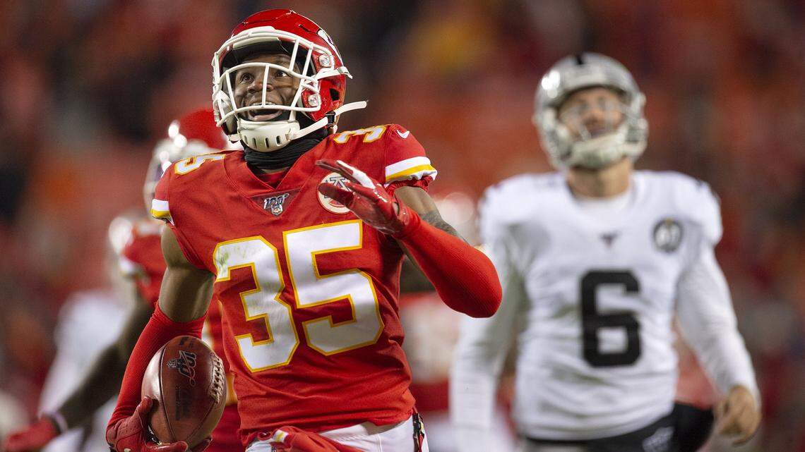 Chiefs cornerback Charvarius Ward runs into the end zone after recovering an extra point blocked by Tanoh Kpassagnon in the fourth quarter against the Oakland Raiders Dec. 1 at Arrowhead Stadium.