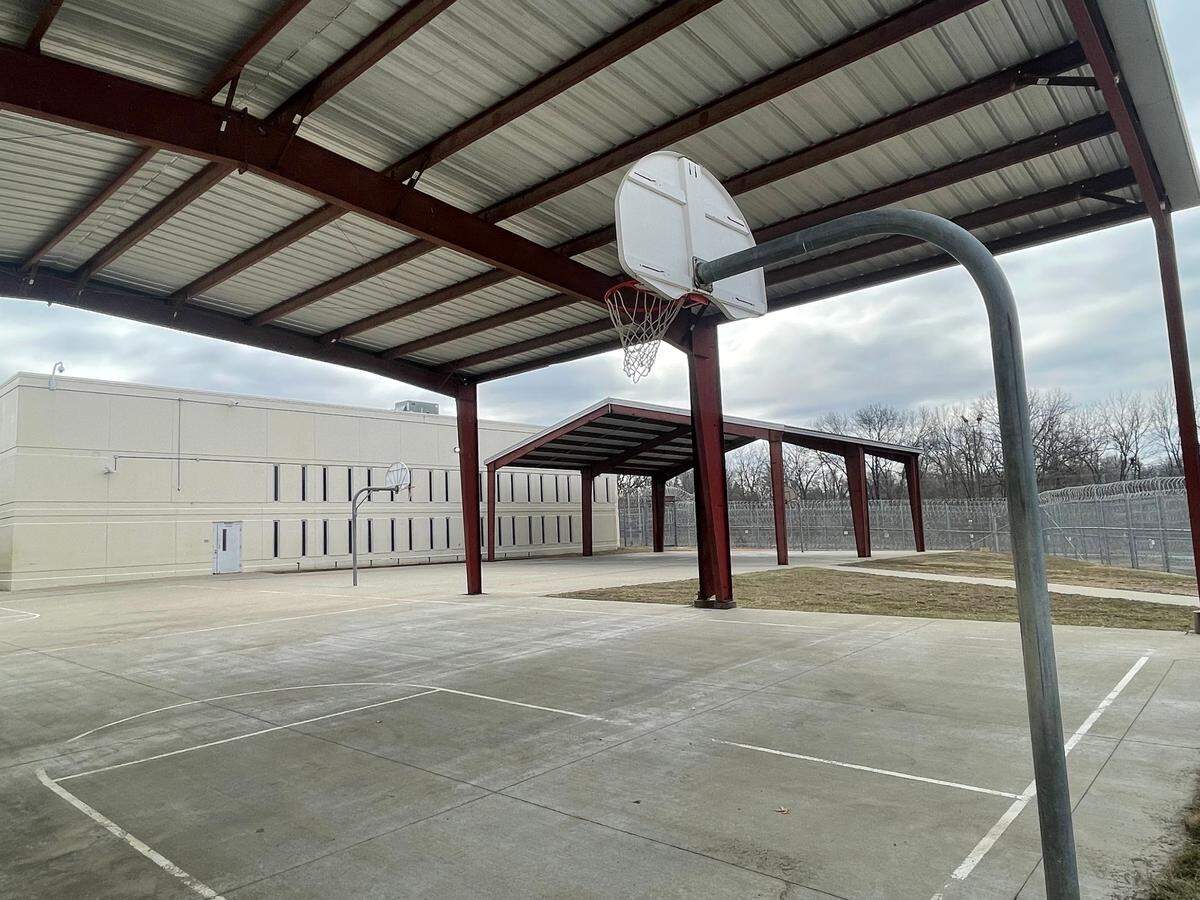 A basketball hoop in one of the two recreation yards at the Midwest Regional Reception Center in Leavenworth, Kansas.