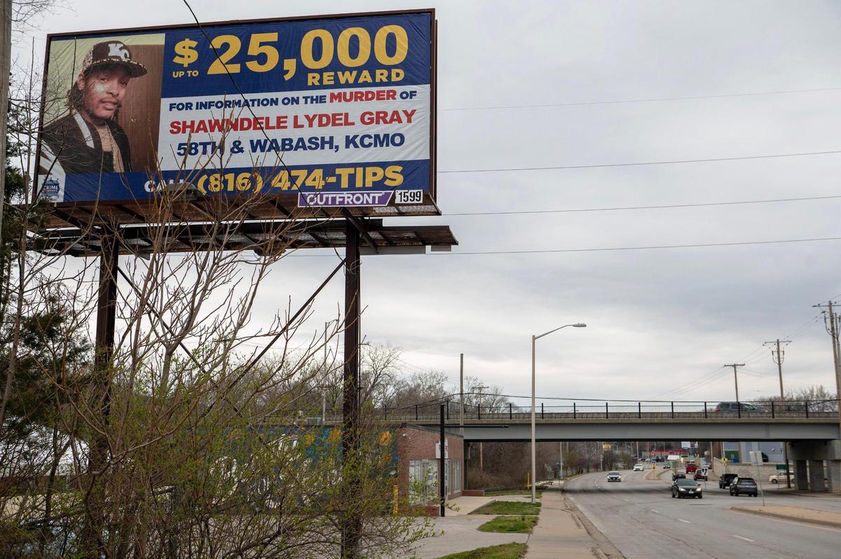 A billboard of Shawndelle Lyle Gray is seen along Troost Avenue near 85th Street on Thursday, March 30, 2023, in Kansas City. Gray’s mother, Sherry Paige, commissioned the billboard hoping to seek justice for the death of her son, who was found shot inside his vehicle two years ago.