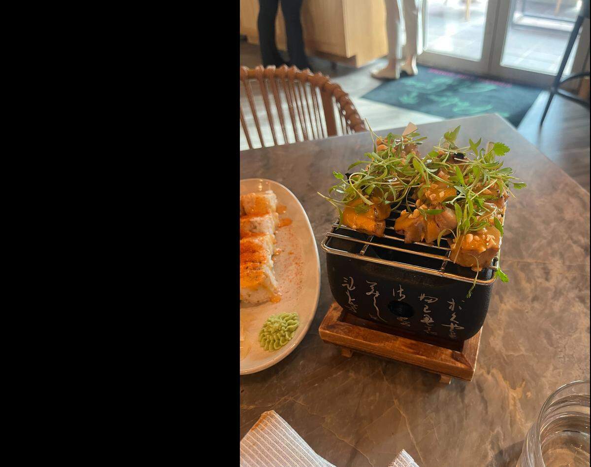 The amish chicken yakitori is topped with a sauce made with thai chili, cilantro and peanuts. It’s available at Palm Tree Club, 14 E. 14th St.
