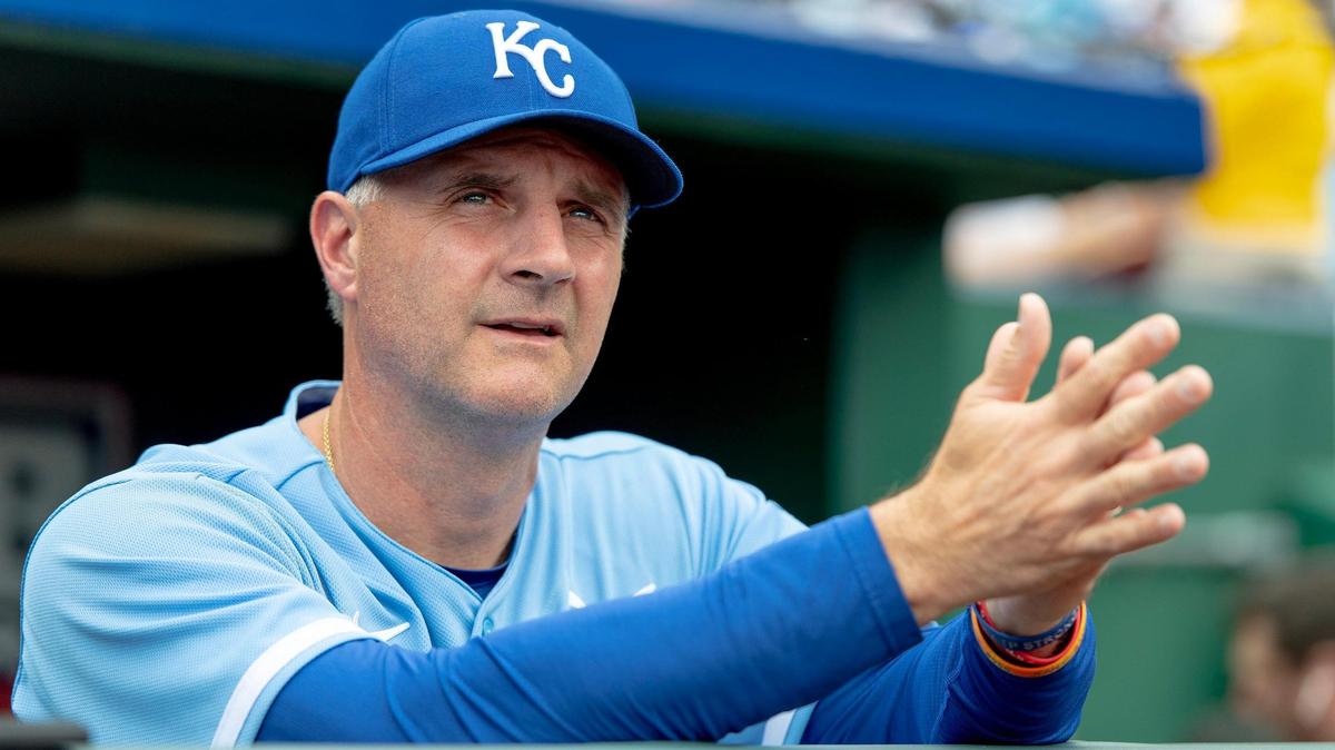Kansas City Royals manager Matt Quatraro (33) stands in the dugout before an opening day baseball game against the Minnesota Twins at Kauffman Stadium, Thursday, March 30, 2023, in Kansas City.