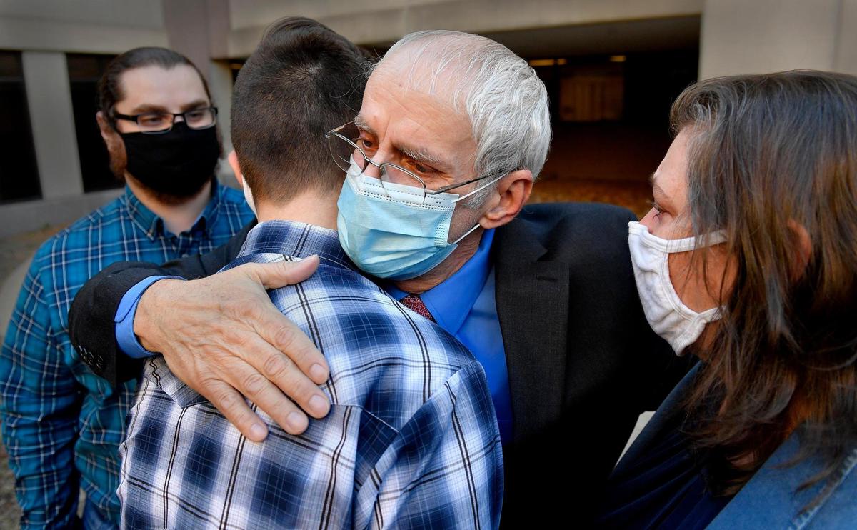 After spending more than 12 in prison for murder, Olin “Pete” Coones walked out of the Wyandotte County Courthouse and into the arms of his family Thursday, November 5, 2020.  The Wyandotte County District Attorney’s Office moved to drop the charges against Coones, now 63, after the judge found Coones received an unfair trial in the 2008 shooting deaths of Kathleen and Carl Schroll.