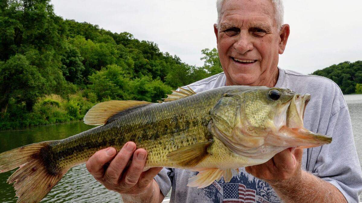 Frank Cooper caught a four-pound largemouth bass on Sunday at Lake Jacomo using a Whopper Plopper.