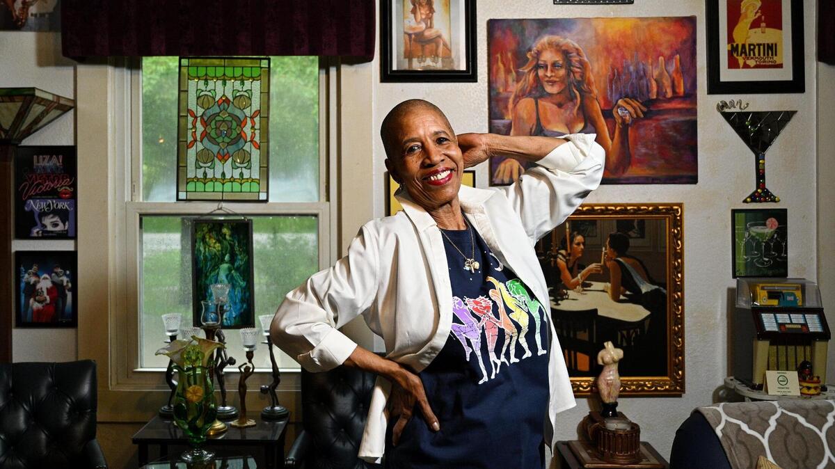Lea Hopkins, 78, was the driving force behind Kansas City’s first Pride March in 1977. Hopkins, a former model in New York, shows off the shirt she chose to wear during a Pride festival.