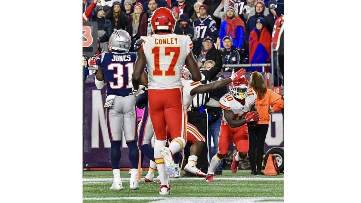 Kansas City Chiefs wide receiver Tyreek Hill slid to catch a touchdown in the fourth quarter against the New England Patriots in Foxborough. It was Chiefs quarterback Patrick Mahomes’ 17th touchdown pass of the 2018 regular season.