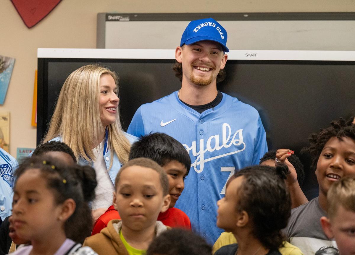 With his fiance, Maggie Black, left, Royals star shortstop Bobby Witt Jr. visits a second-grade classroom to promote literacy on Tuesday, May 21, 2024, at Ingels Elementary School in the Hickman Mills School District.