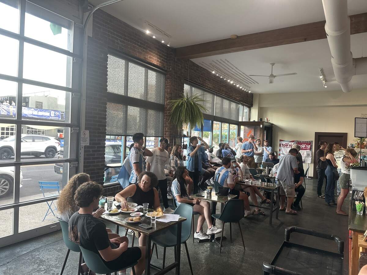 A small crowd waits for the World Cup game between Argentina and Algeria to begin at Cafe Corazon, a coffee shop with Argentine influences in Kansas City’s Crossroads on Tuesday, June 16, 2026.