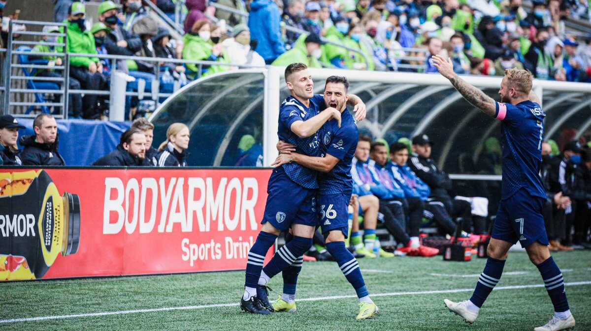 Sporting KC players celebrate the opening goal of the game in the fourth minute Saturday afternoon against the Sounders at Lumen Field in Seattle.