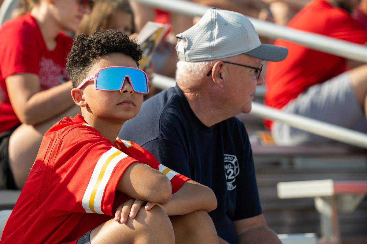 A young “clone” of Patrick Mahomes takes in practice during a hot morning at training camp in St. Joseph.