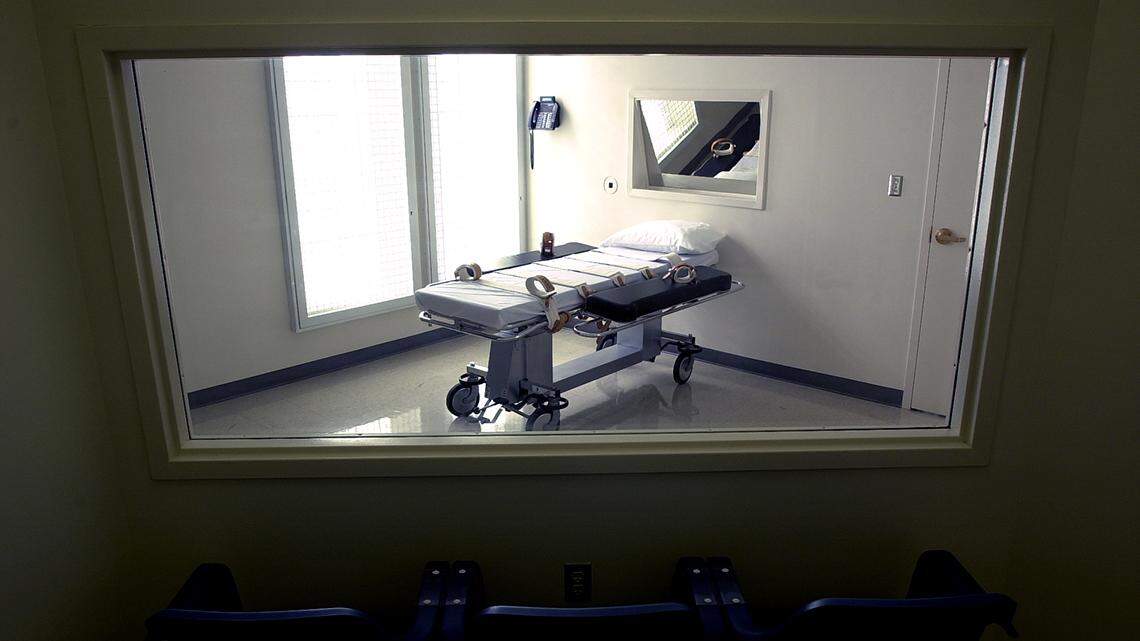 The new Kansas execution chamber at the Lansing Correctional Facillty viewed from the small room where people of the inmate’s choosing can witness the proceedings.  102501  Keith Myers/The Kansas City Star    cutline: A new execution chamber, seen from the gallery, awaits death-row inmates at Kansas’ Lansing Correctional Facility. The fates of eight Kansas inmates rest with a case that the U.S. Supreme Court will hear this week. ORG XMIT: CTI5IQV    cutline: Thus far unused in Kansas, this chamber at the Lansing Correctional Facility eventually may be the site for executions now that the U.S. Supreme Court has upheld the state’s death penalty law. Some Kansas inmates who have been sentenced to death: ORG XMIT: 6NMF0I4