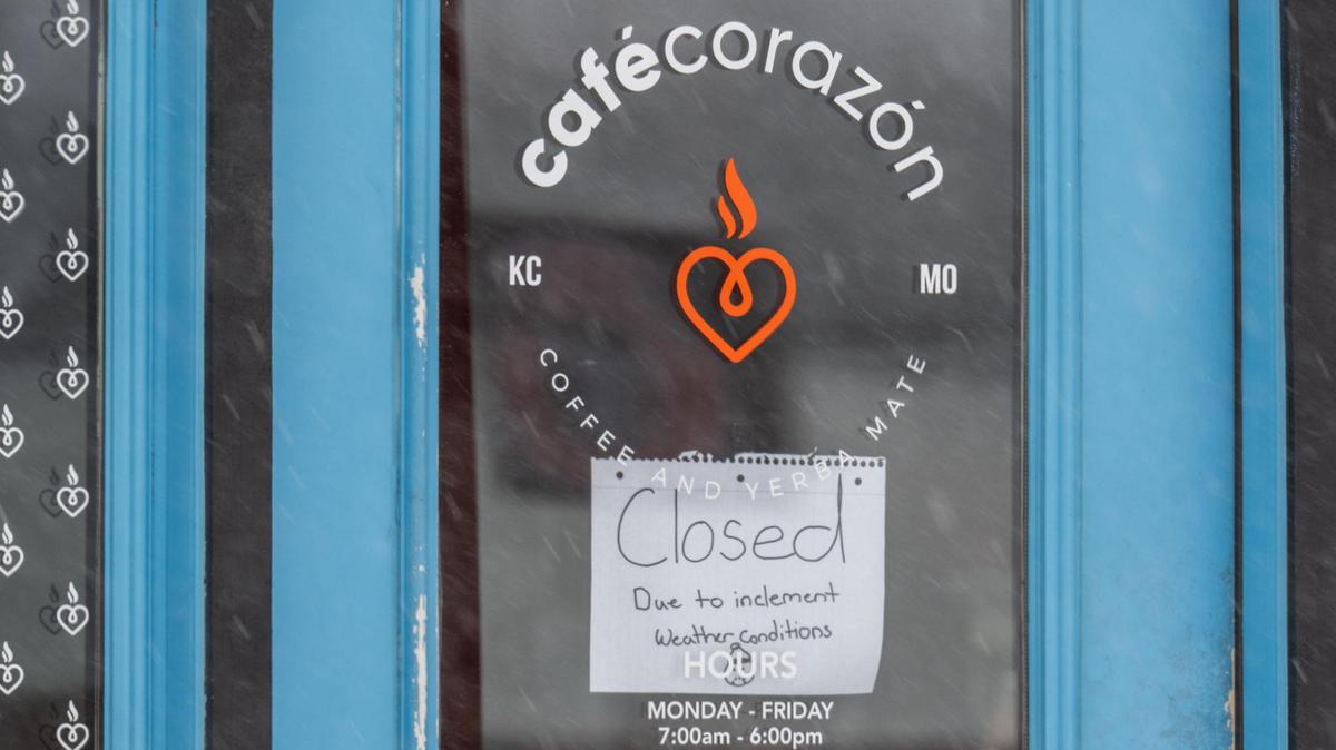 A sign on the door of Café Corazón’s Westport location showing the business is “closed due to inclement weather conditions” on Sunday, Jan. 5, 2025. Several businesses in Kansas City were closed on Sunday due to the weather.