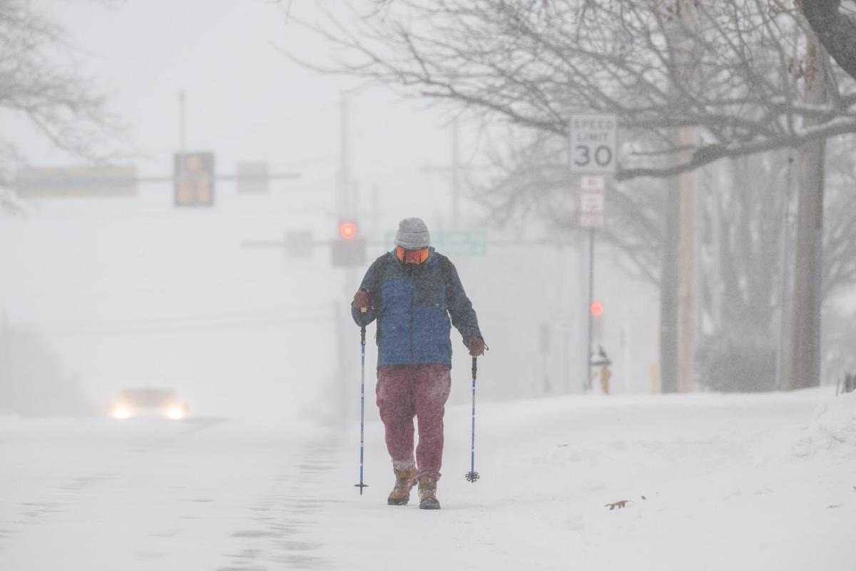 Arnold Ressin of Westwood walks back from a closed Walmart location during a snowstorm on Sunday, Jan. 5, 2025. Ressin wanted a few ingredients for a chili he was making before the Chiefs game.