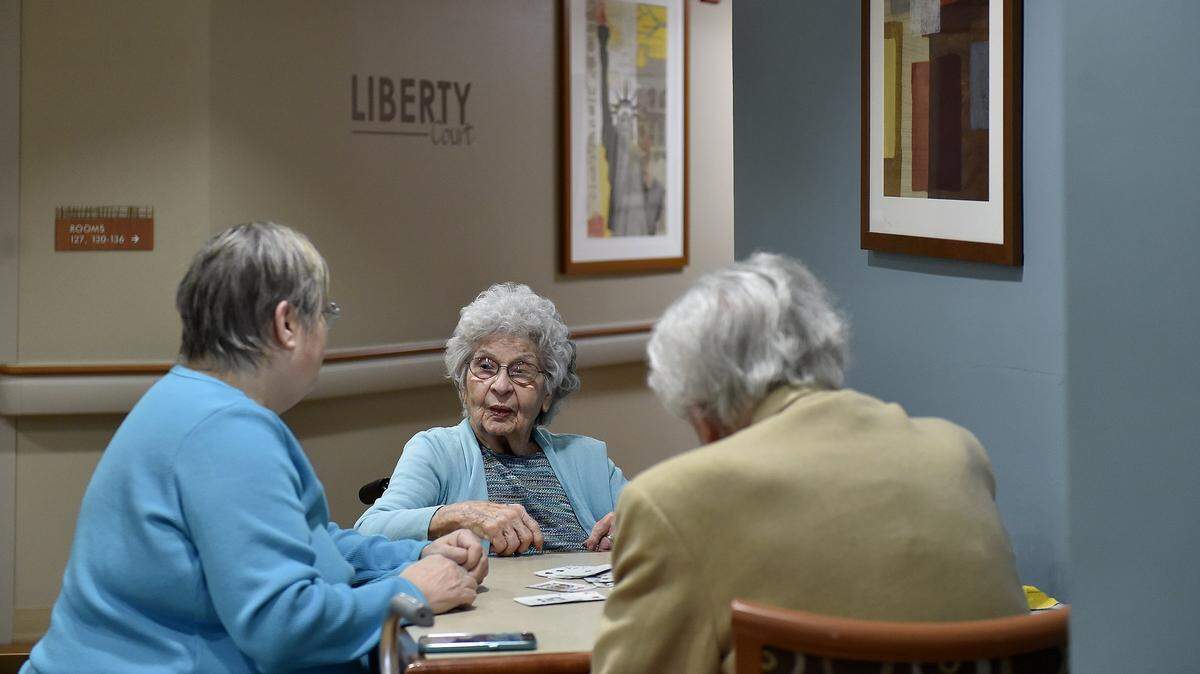 Medicare's Nursing Home Compare website gives Lakeview Village in Lenexa five stars in all categories. Phylas (cq) Lose (center) has been at the facility for about 15 years. Lose, her daughter Jan Morehead (left) and Lose's male companion play cards Monday, Jan. 29, 2018.