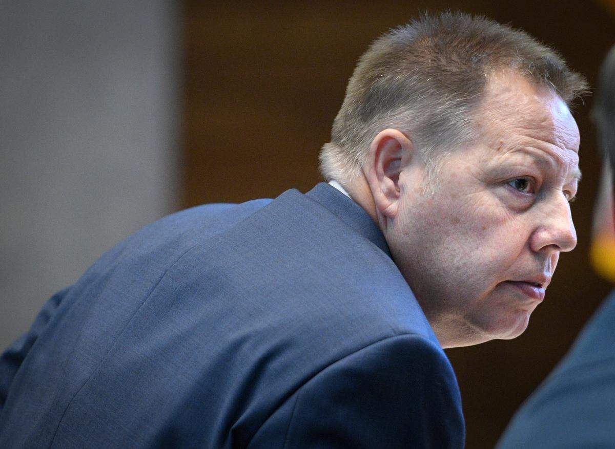 Police Chief Rick Smith listens to a presentation during the Board of Police Commissioners meeting Feb. 22 at Kansas City Police Headquarters. Smith on Friday said he will officially step down from his duties in April.