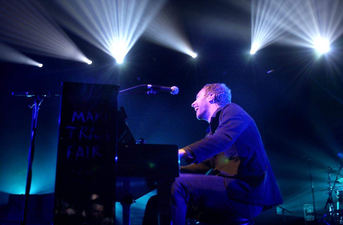 Chris Martin, the lead vocalist with the band Coldplay, peforms during a 2003 concert at Memorial Hall.