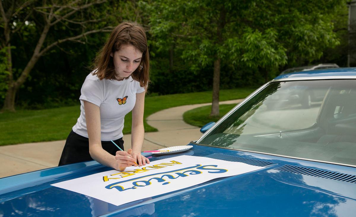 Audrey McBride, 17, is graduating from Liberty High School. She decorated her dad’s 1973 Chevrolet Monte Carlo on Friday, for a car parade on Sunday for seniors. She is planning to attend the University of Kansas in the fall.