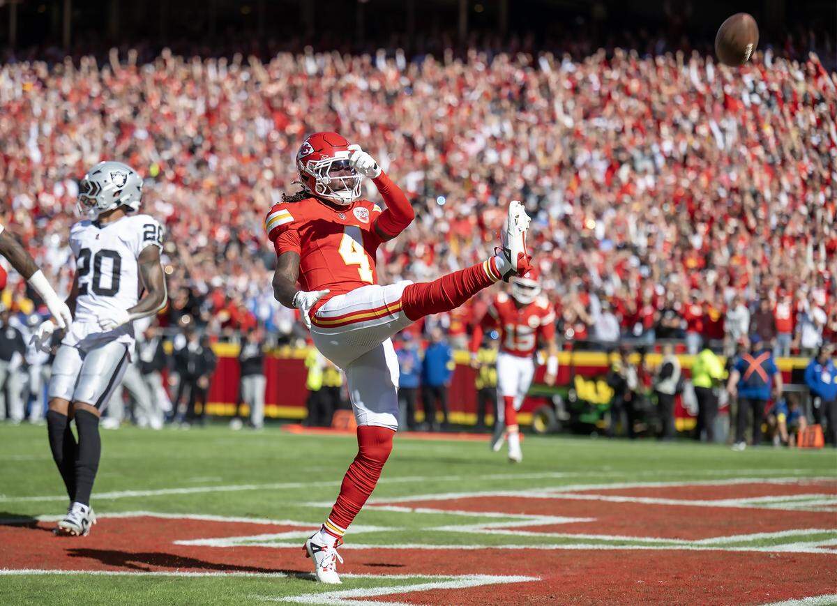 Chiefs wide receiver Rashee Rice kicks the ball into the stands in celebration after scoring a touchdown against the Las Vegas Raiders at GEHA Field at Arrowhead Stadium in Kansas City on Sunday, Oct. 19. 2025.