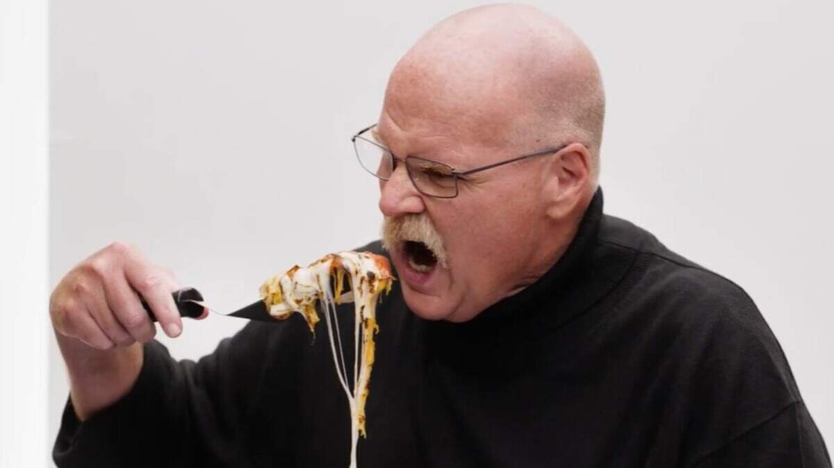 Andy Reid stars as a hand model in a new shoe commercial.
