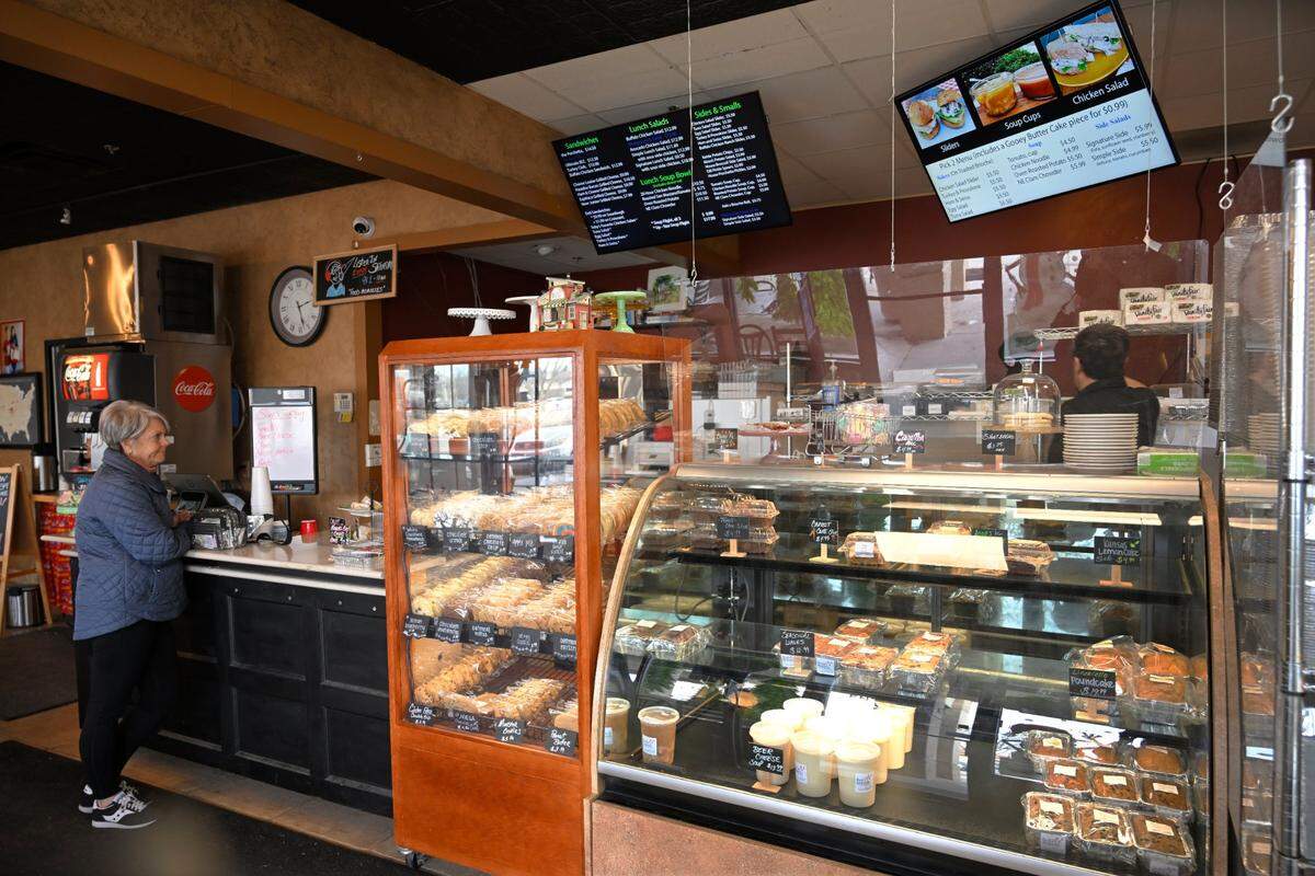 Owner Robert Duensing, right, offers more than 30 sandwiches, plus soups and sandwiches, on the Best Regards menu. Some people who come in for the baked goods don’t realize lunch is served too.