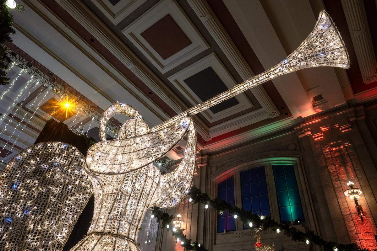 An oversized lighted angel greets guests at “Holiday Reflections” at Union Station on Thursday, November 20, 2025, in Kansas City.