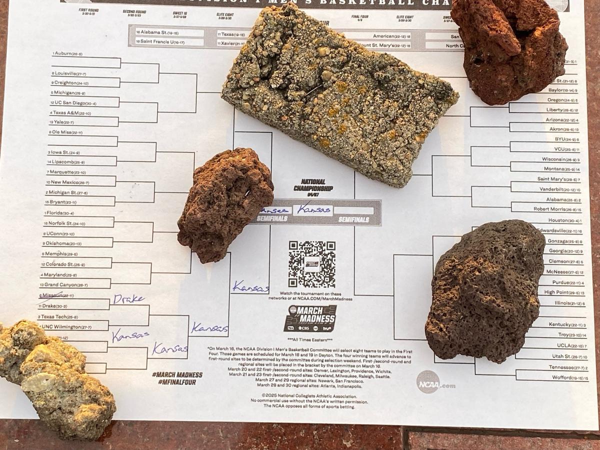 A KU basketball fan has left his March Madness bracket picks at the gravesite of James Naismith, the creator of basketball who is buried in Lawrence.