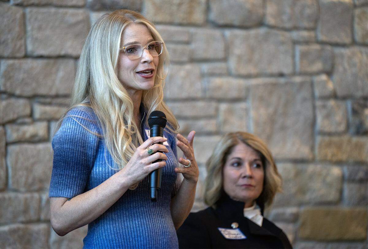 Shelby Bartelt, a candidate for Council Member Ward 3, speaks during a candidates forum at the Meadowbrook  Club House in Prairie Village on Thursday, October 9, 2025. Kelly Sullivan Angles, a candidate for Council Member Ward 4 in Prairie Village, is at the right. 
