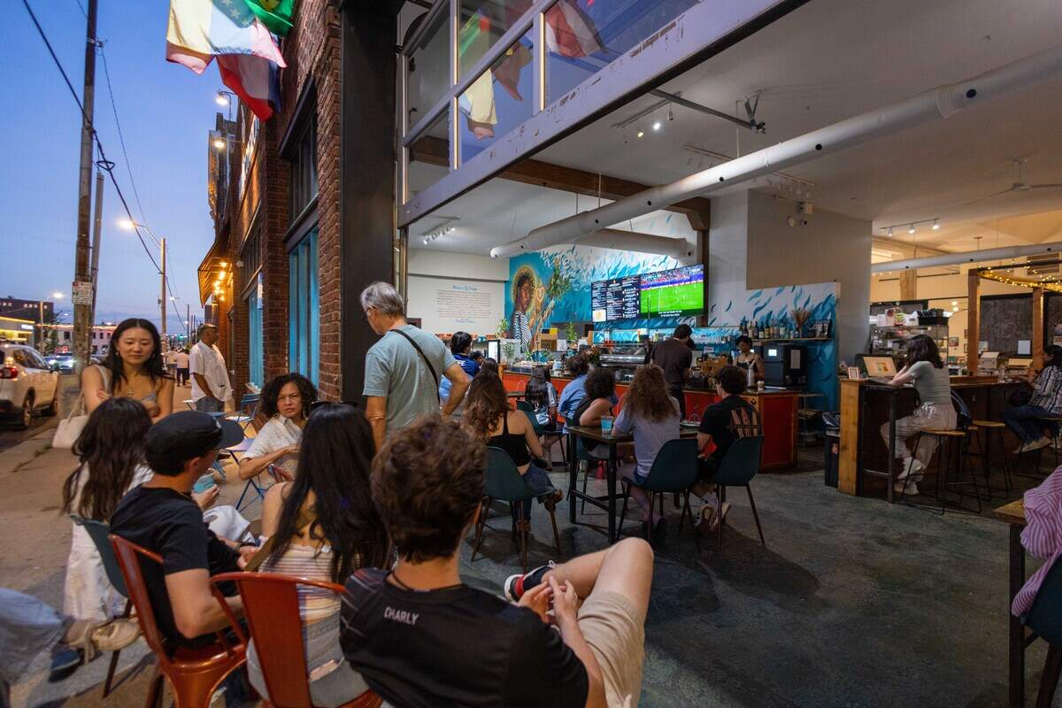 Fans at Café Corazón on Southwest Boulevard talk during a watch party for the World Cup game between Algeria and Argentina, which was held in Kansas City, on Tuesday, June 16, 2026.