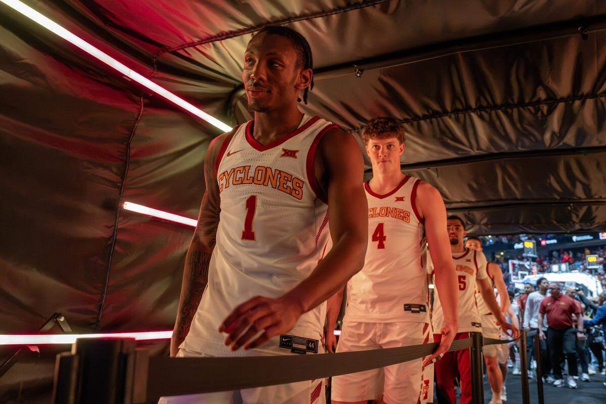 Iowa State Cyclones guard Jamarion Batemon (1) walks through a red-lit tunnel after Iowa State defeated Arizona State 91-42 in a Big 12 men's basketball tournament game at T-Mobile Center on Wednesday, March 11, 2026, in Kansas City.