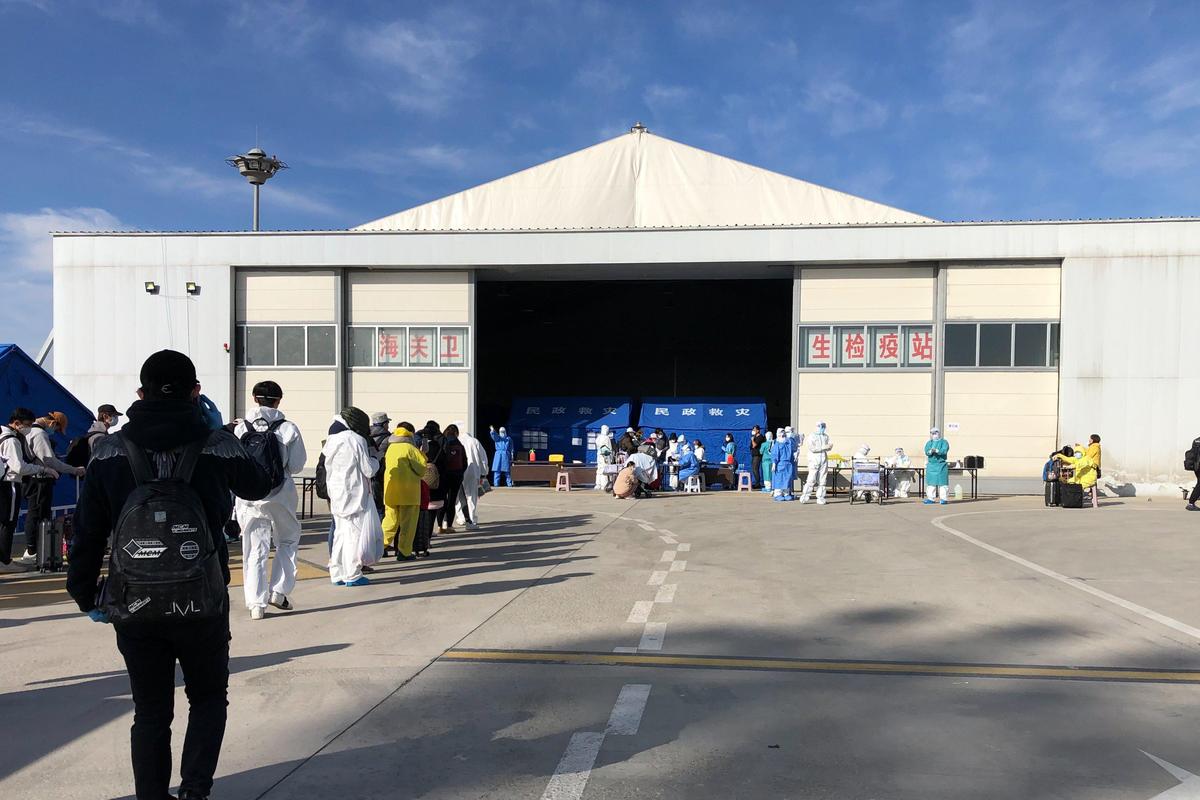 At an airport warehouse in Hohhot, China, international passengers were tested for COVID-19, for free.