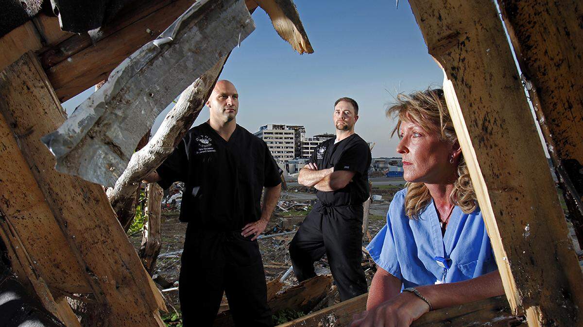 Dusty Smith (from left), Chris Jones and Sharell Questelle were all on duty the night the tornado hit St. John’s hospital.