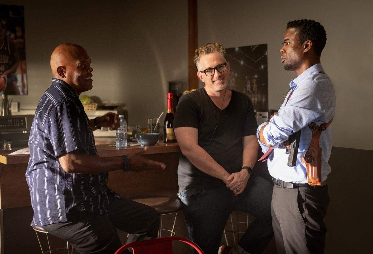 From left, Samuel L. Jackson, director Darren Bousman (an alum of Shawnee Mission North High School) and Chris Rock on the set of the movie “Spiral.”