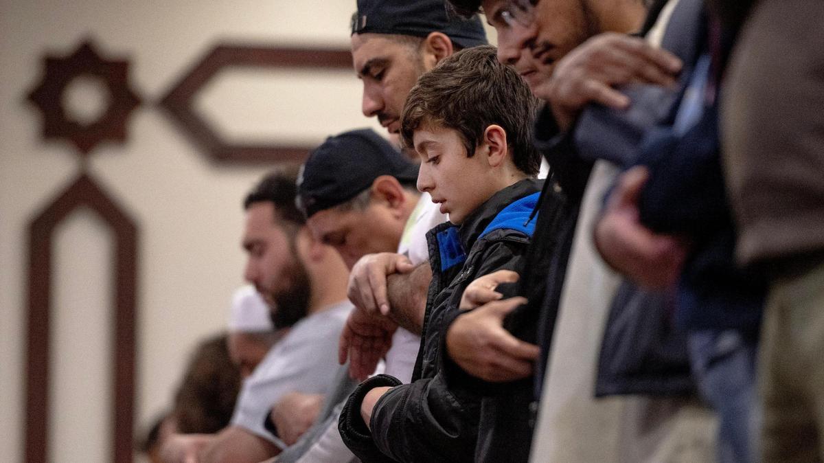 Muslims pray during the Islamic night prayer known as Isha for Ramadan at the Islamic Society of Greater Kansas City on Monday, April 10, 2023, in Kansas City.