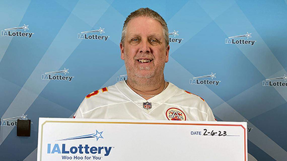 Brad Carter with his $443,507 check.