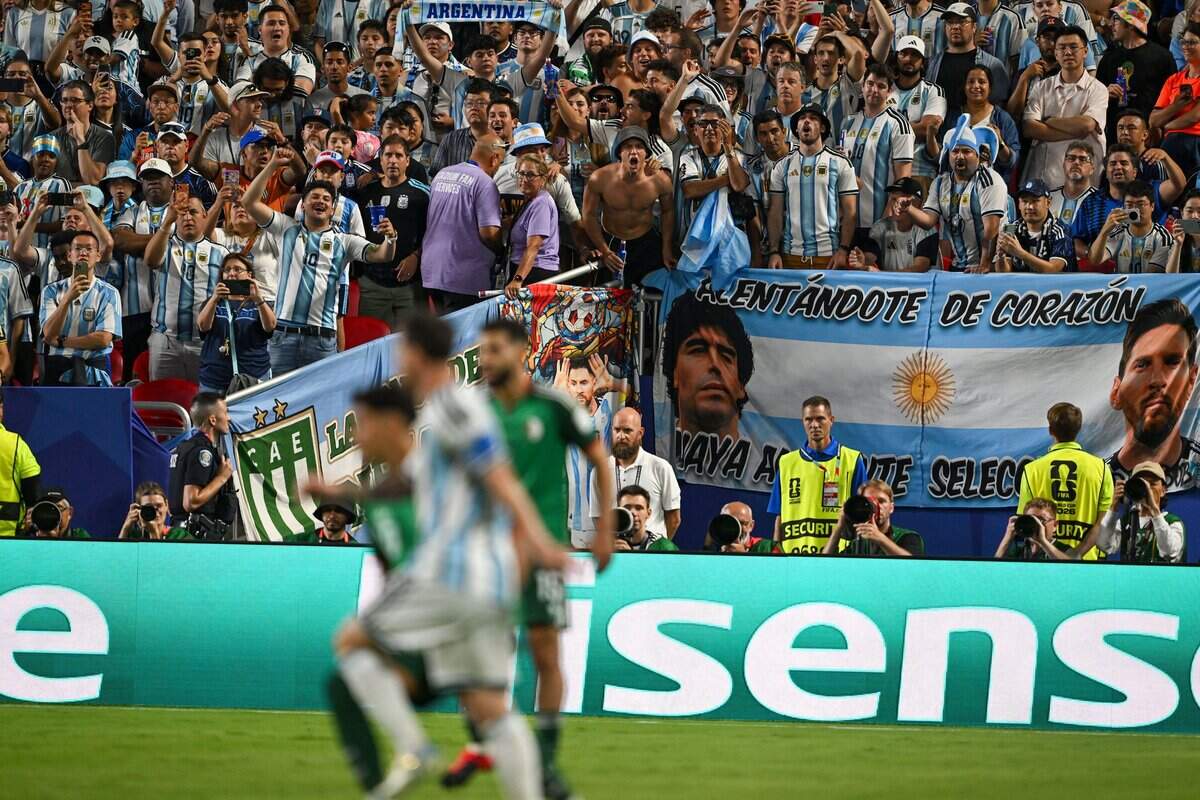 The Argentina fans stay on their feet to cheer at the Argentina vs. Algeria FIFA World Cup group-stage soccer match at Kansas City (Arrowhead) Stadium in Kansas City on Tuesday, June 16, 2026.