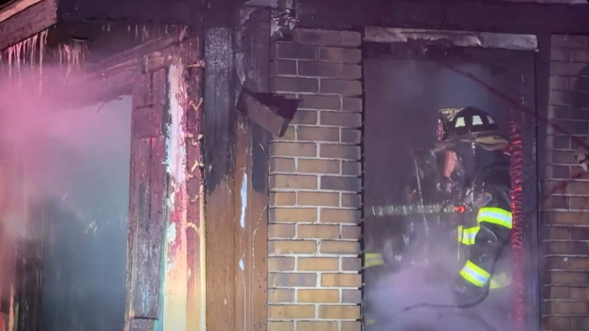 A duplex in Olathe was severely damaged after a fire started in a laundry room Friday. Four people were displaced, and two pets were killed, the fire department said.