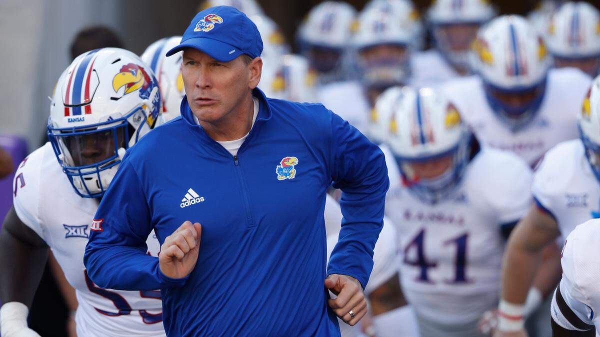 Kansas head coach Lance Leipold takes the field with his team before playing TCU in an NCAA college football game Saturday, Nov. 20, 2021, in Fort Worth, Texas. TCU won 31-28. (AP Photo/Ron Jenkins)
