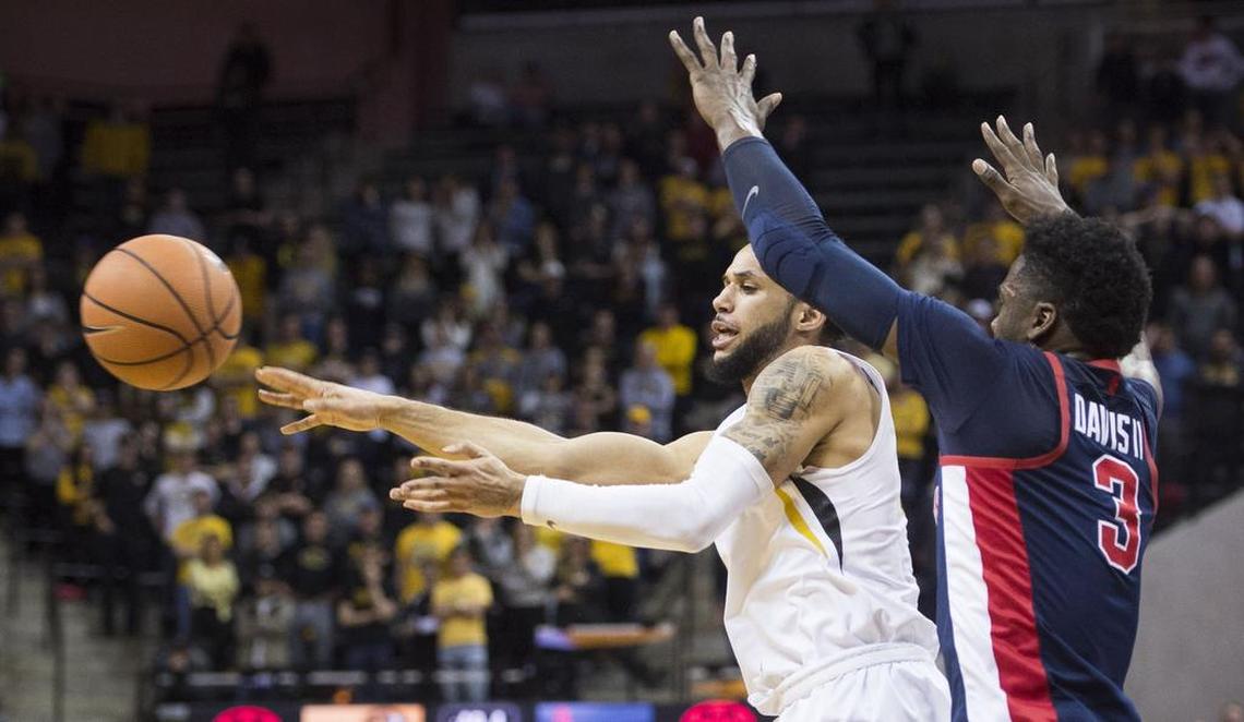 Missouri Tigers guard Kassius Robertson (3) threw a pass out of bounds as he was defended by Mississippi Rebels guard Terence Davis (3) in the overtime during the University of Missouri and University of Mississippi Southeastern Conference basketball game at Mizzou Arena on Tuesday, February 20, 2018, in Columbia, Missouri. Ole Miss beat Mizzou 90-87 in overtime.