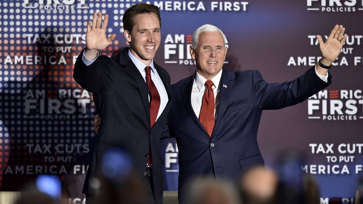 Vice President Mike Pence spoke in July at the Kansas City Marriott Downtown. Pence was introduced by Missouri Attorney General Josh Hawley (left).